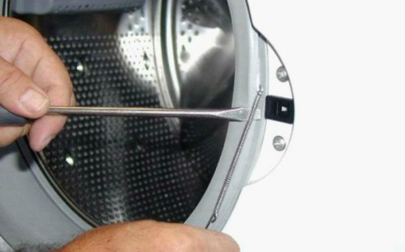 Премахване на ластика на барабана на пералнята